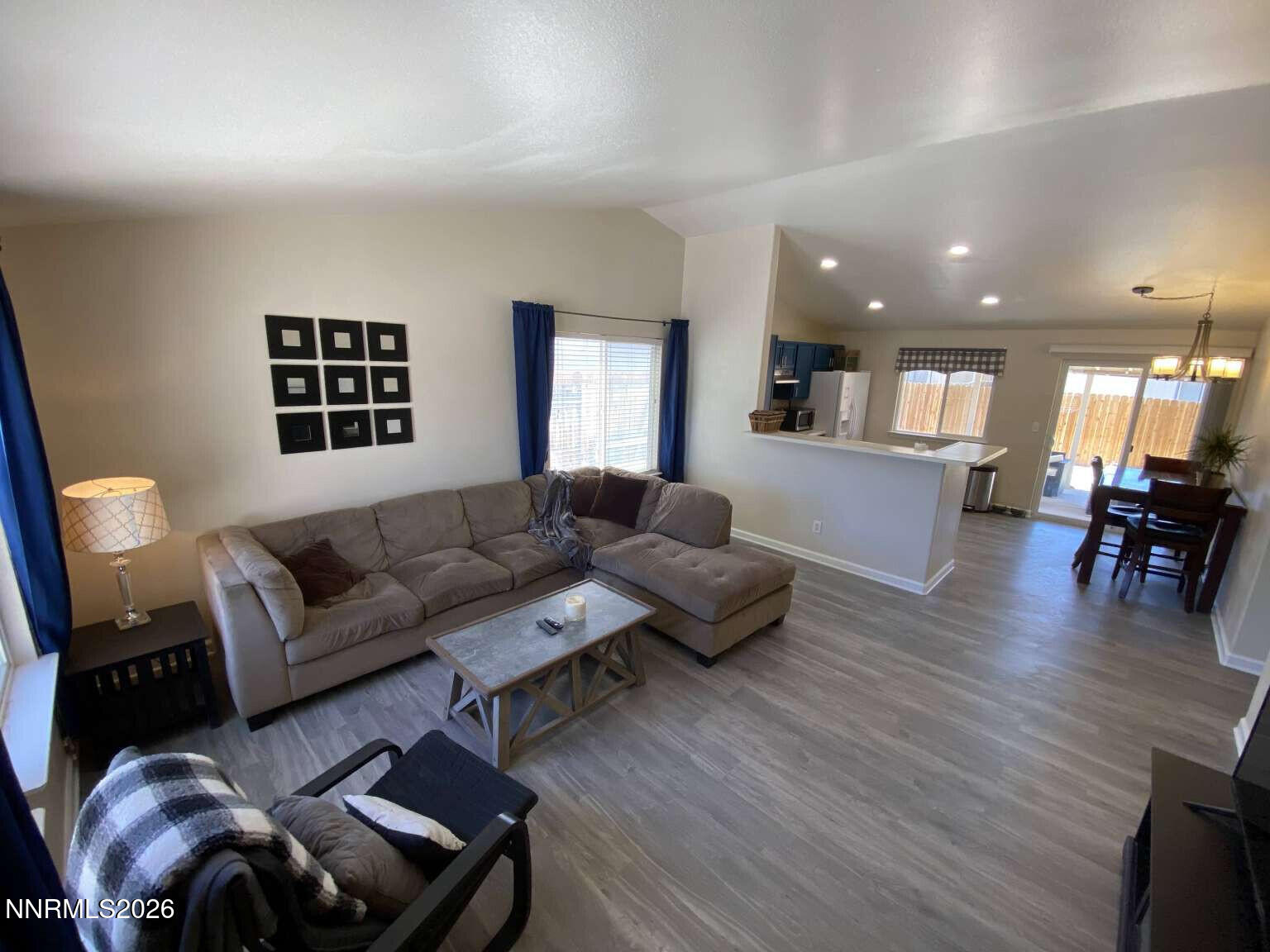 621 Keppel Street Fallon, NV 89406 - Photo 2 of 15 a living room with furniture and wooden floor