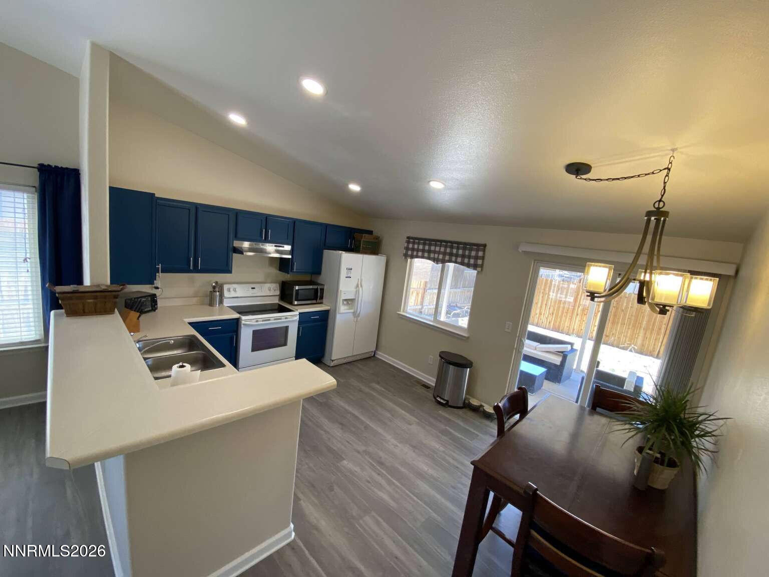 621 Keppel Street Fallon, NV 89406 - Photo 3 of 15 a view of kitchen and dining room with wooden floor