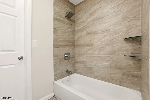 a bathroom with a bathtub