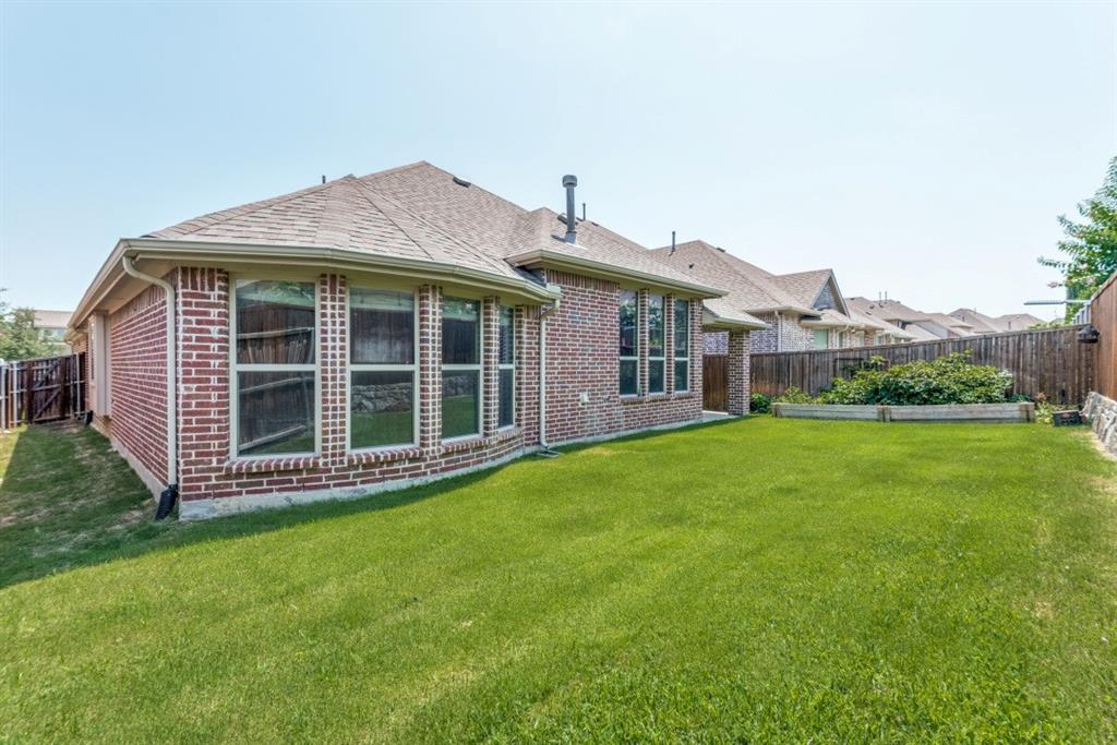 2364 Mare Road Carrollton, TX 75010 - Photo 25 of 25 a view of a house with a garden