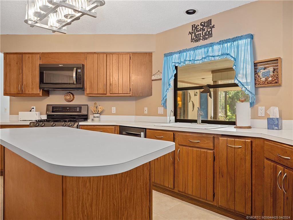 1623 Southwest Gregor Way Stuart, FL 34997 - Photo 19 of 42 Kitchen Island