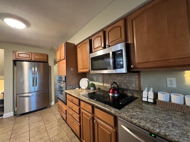 5582 Pocusset Street Pittsburgh, PA 15217 - Photo 15 of 29 a kitchen with stainless steel appliances granite countertop a refrigerator sink and microwave