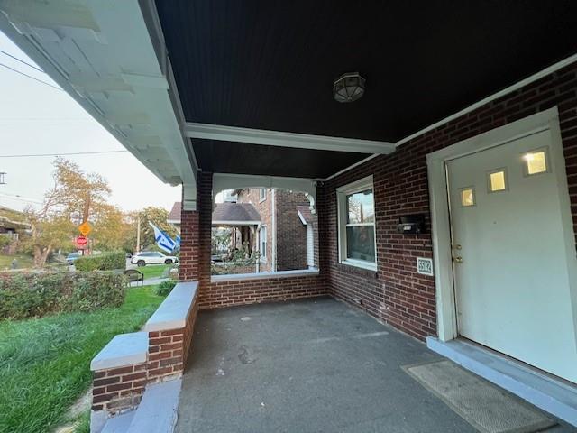 5582 Pocusset Street Pittsburgh, PA 15217 - Photo 26 of 29 a view of a porch with furniture and garden