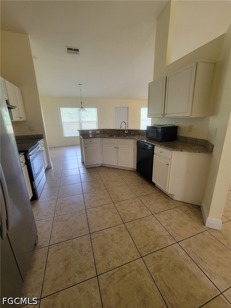 8071 Liriope Loop Lehigh Acres, FL 33972 - Photo 3 of 14