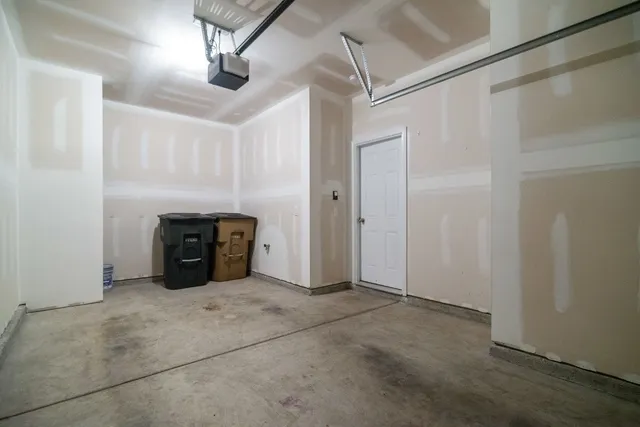 a view of an empty room with windows