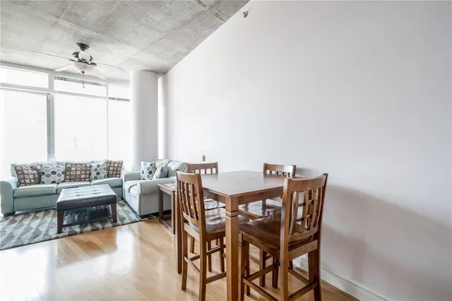 a view of a dining room with furniture window and outside view