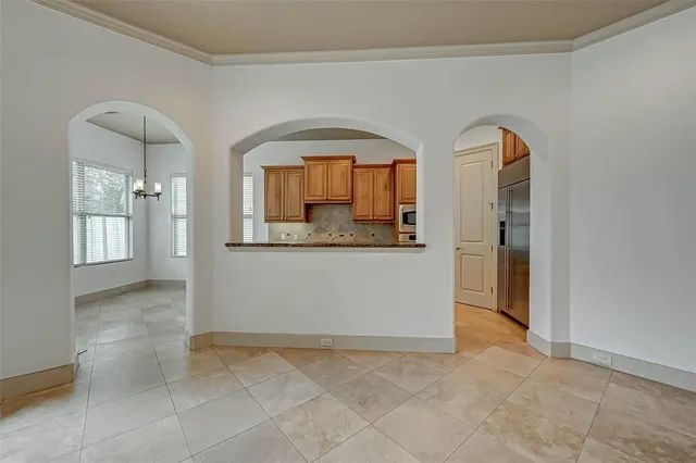a view of a hallway with entryway