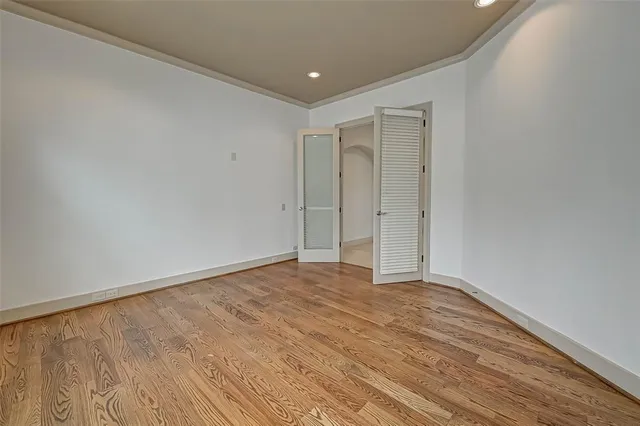 a bathroom with a granite countertop shower a mirror and a bathtub