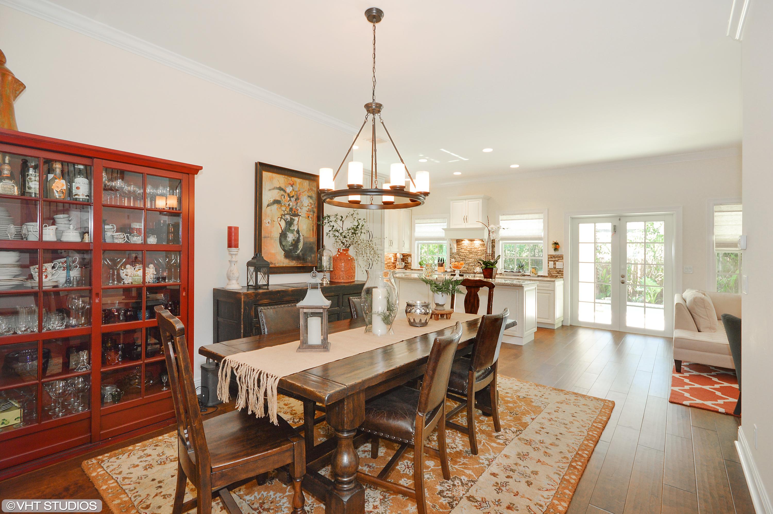 526 Sunset Road West Palm Beach, FL 33401 - Photo 6 of 22 526 Sunset Rd Dining Room and Kitchen