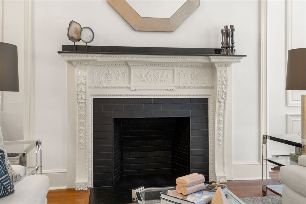 113 Commonwealth Avenue, Unit 3 Boston, MA 02116 - Photo 12 of 30 a close view of a fireplace in a room