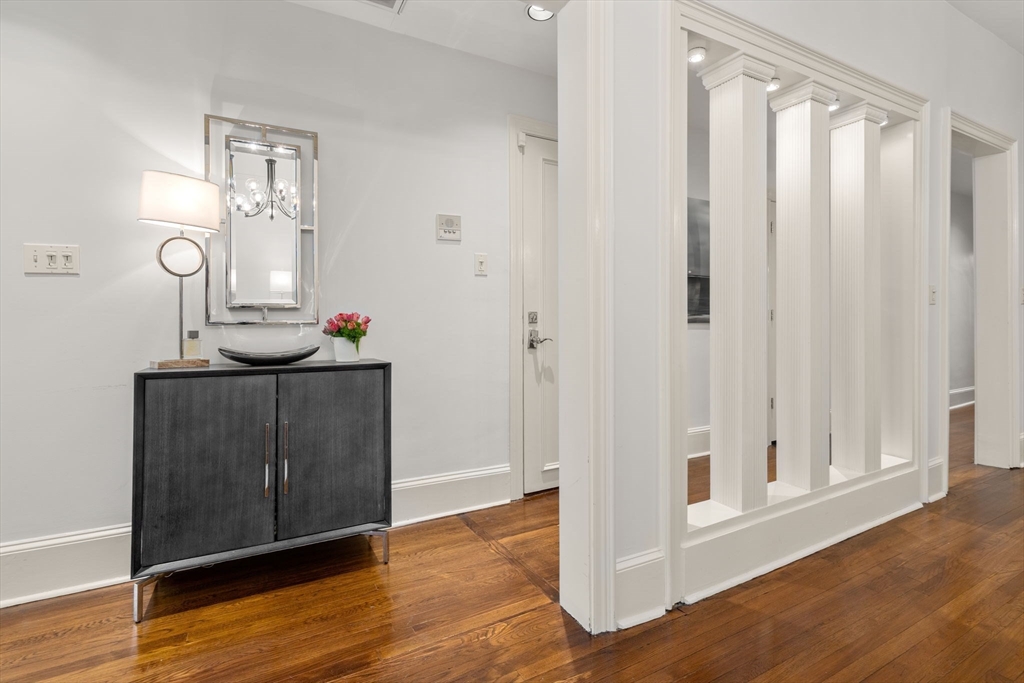 113 Commonwealth Avenue, Unit 3 Boston, MA 02116 - Photo 4 of 30 a view of a livingroom with wooden floor