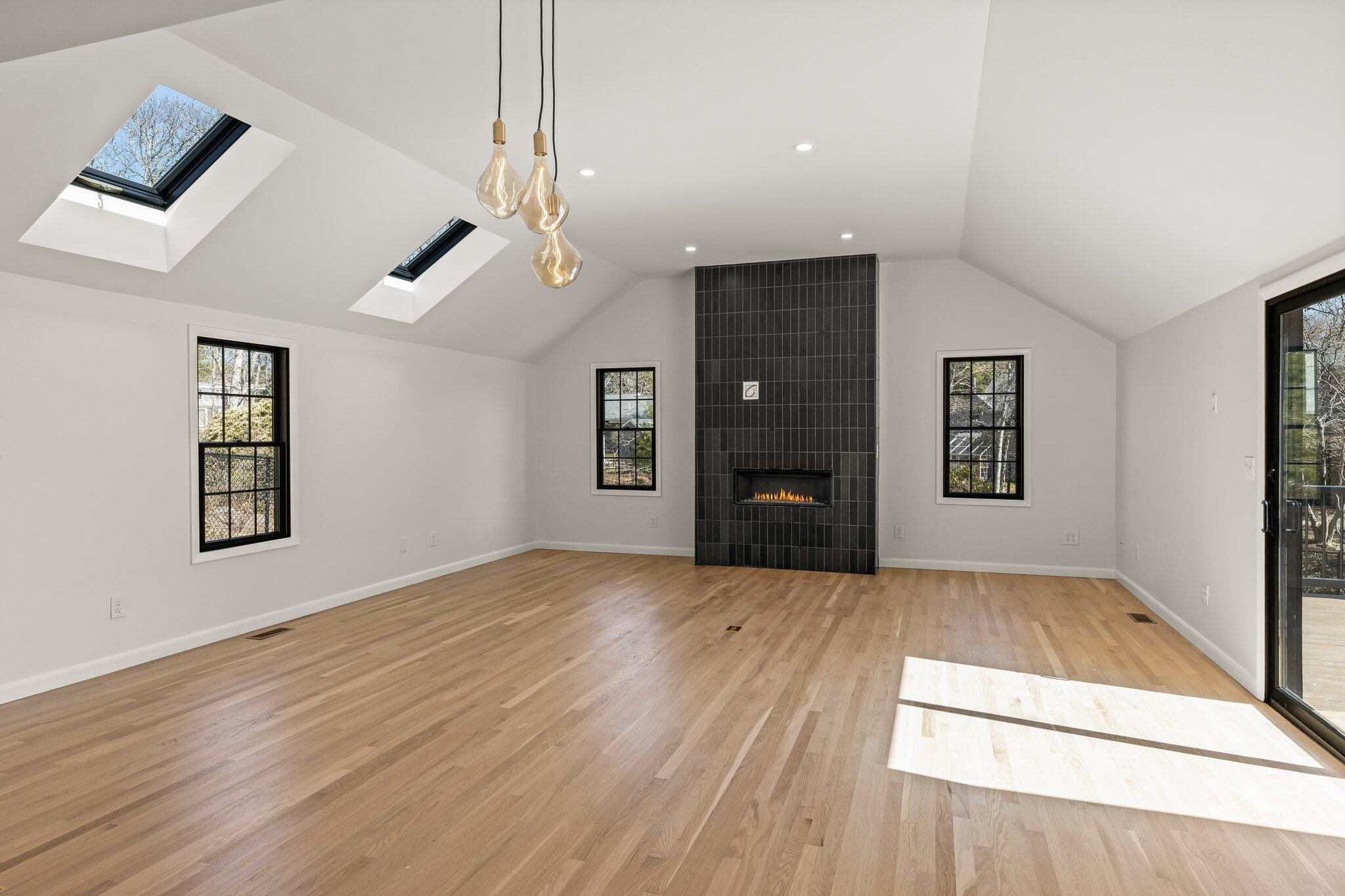 101 Monomoyic Way Chatham, MA 02633 - Photo 11 of 59 a view of empty room with wooden floor