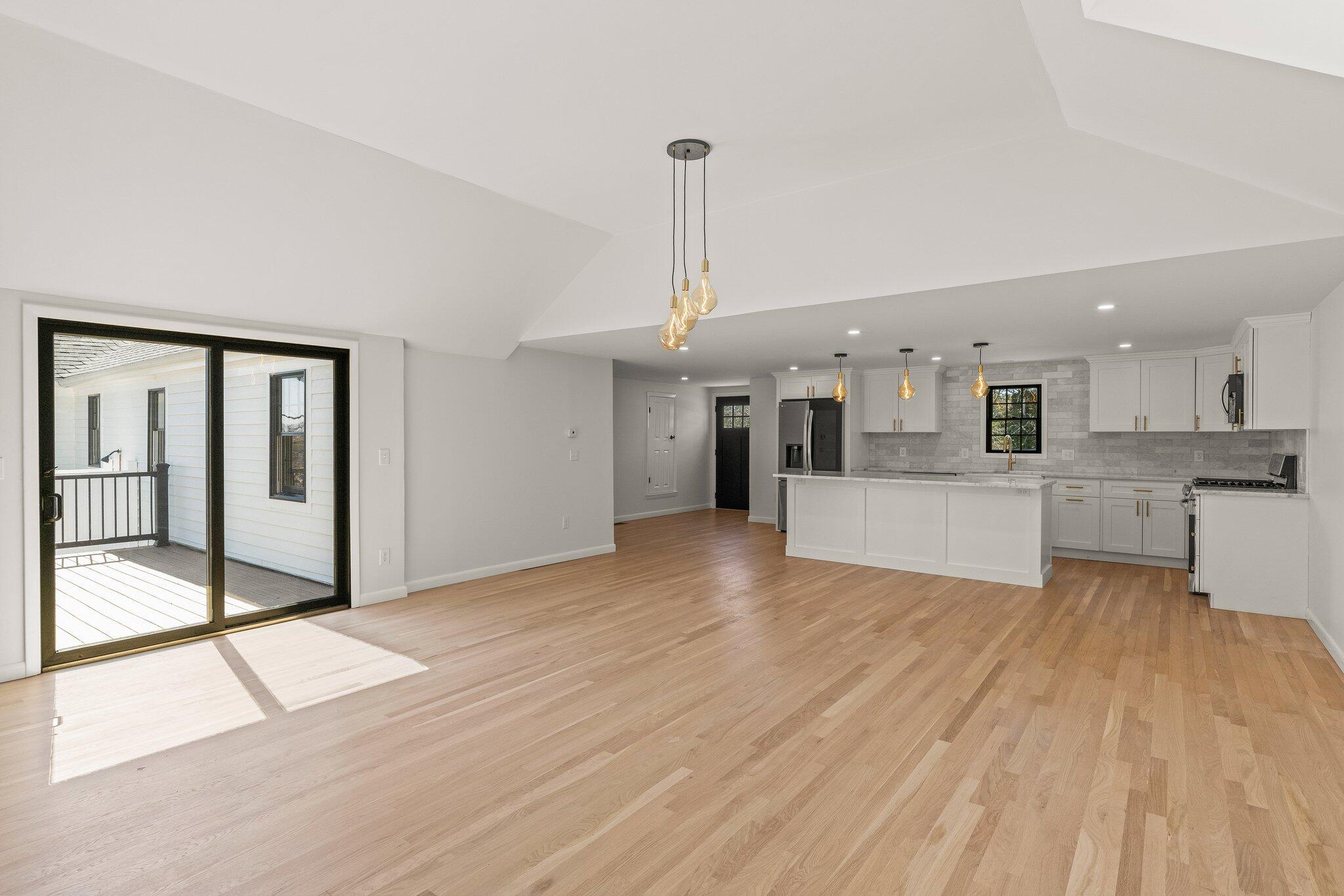 101 Monomoyic Way Chatham, MA 02633 - Photo 17 of 59 a view of a kitchen with wooden floor and a kitchen