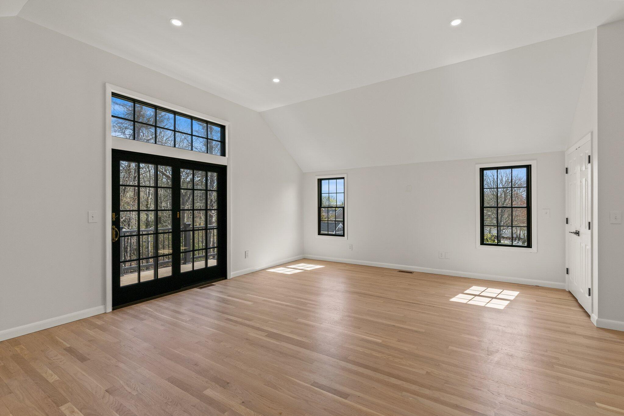 101 Monomoyic Way Chatham, MA 02633 - Photo 24 of 59 wooden floor in an empty room with a window