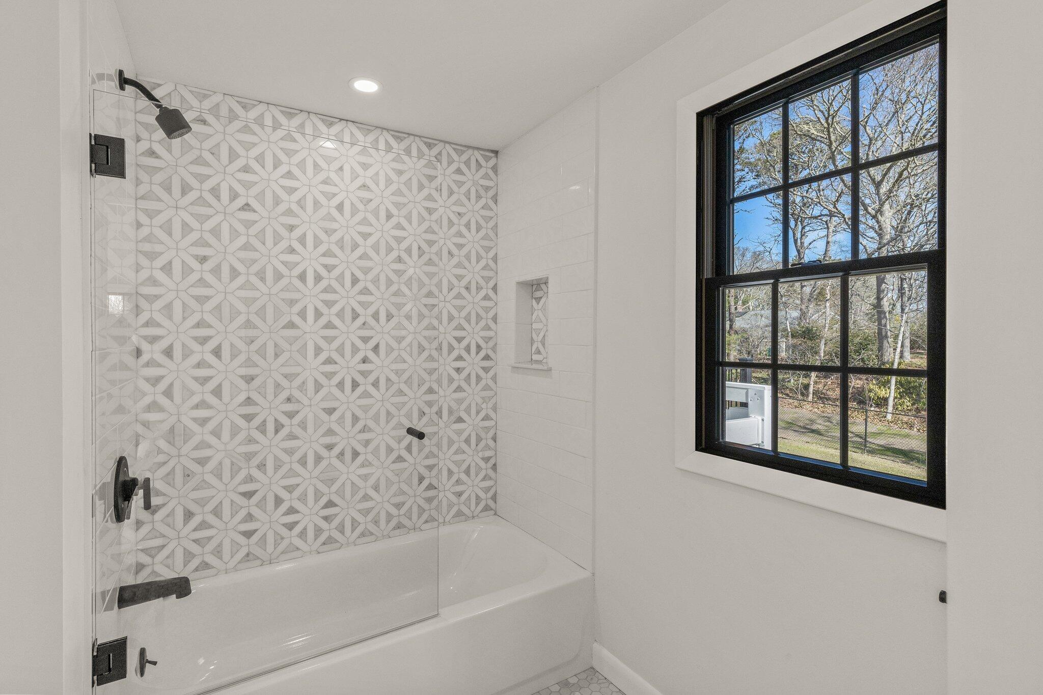 101 Monomoyic Way Chatham, MA 02633 - Photo 29 of 59 a bathroom with a bathtub and shower