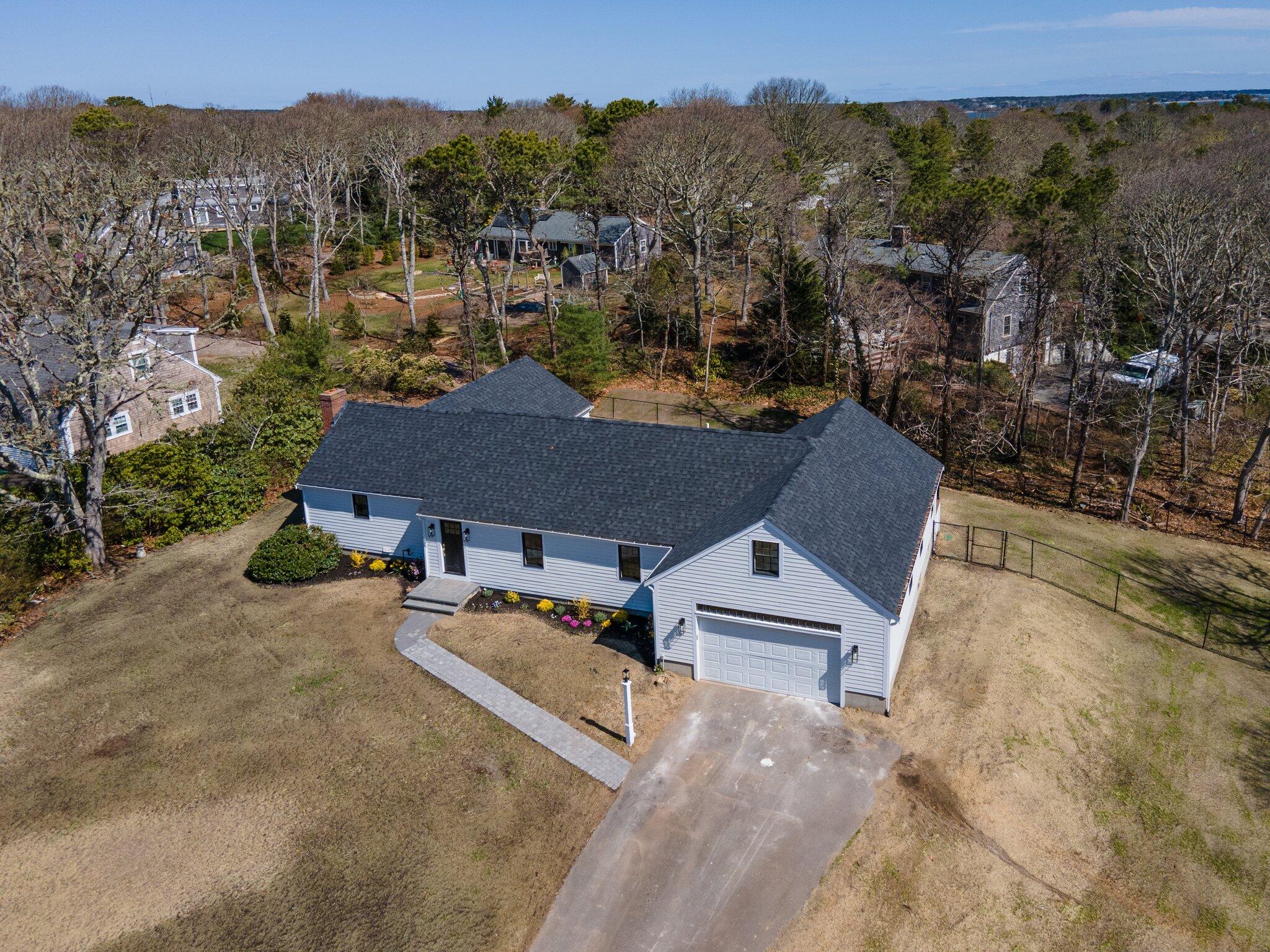101 Monomoyic Way Chatham, MA 02633 - Photo 42 of 59 an aerial view of a house with a garden