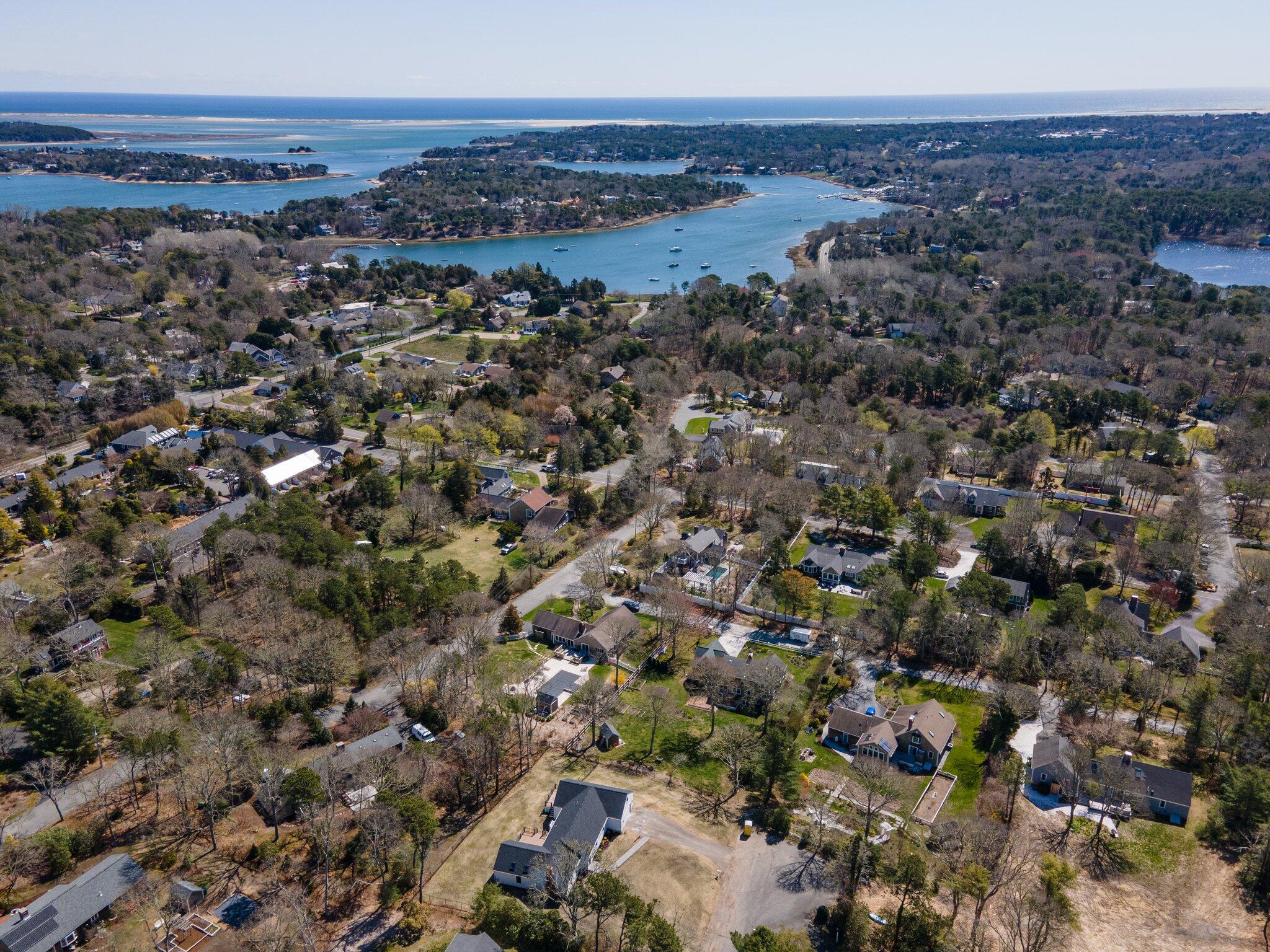 101 Monomoyic Way Chatham, MA 02633 - Photo 50 of 59 an aerial view of residential house and car parked