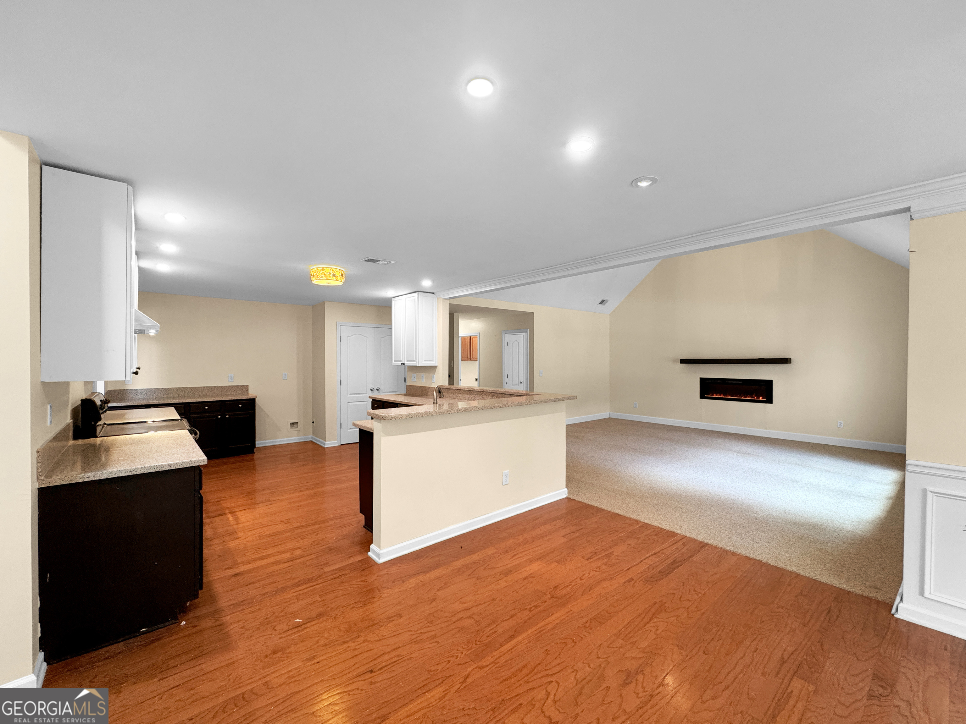 2022 Standing Rock Road Senoia, GA 30276 - Photo 15 of 36 a large white kitchen with a stove a sink and a refrigerator
