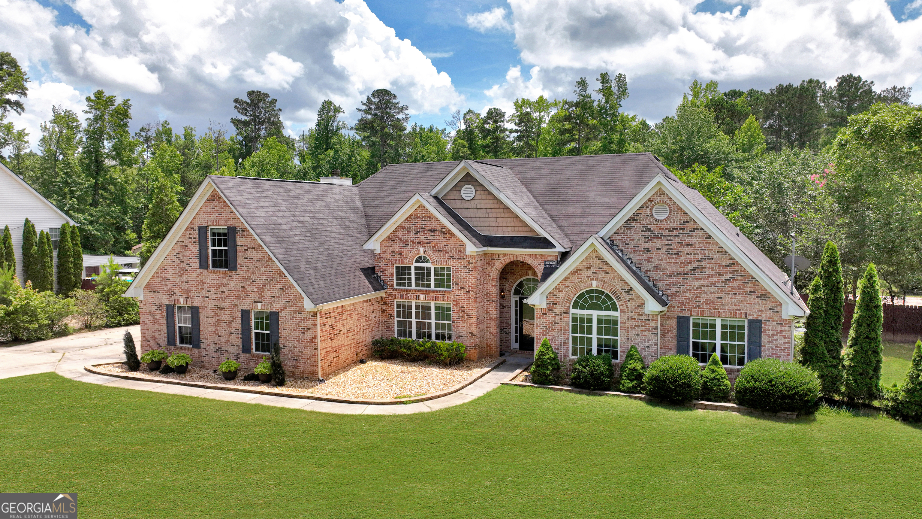 2022 Standing Rock Road Senoia, GA 30276 - Photo 3 of 36 a aerial view of a house next to a yard