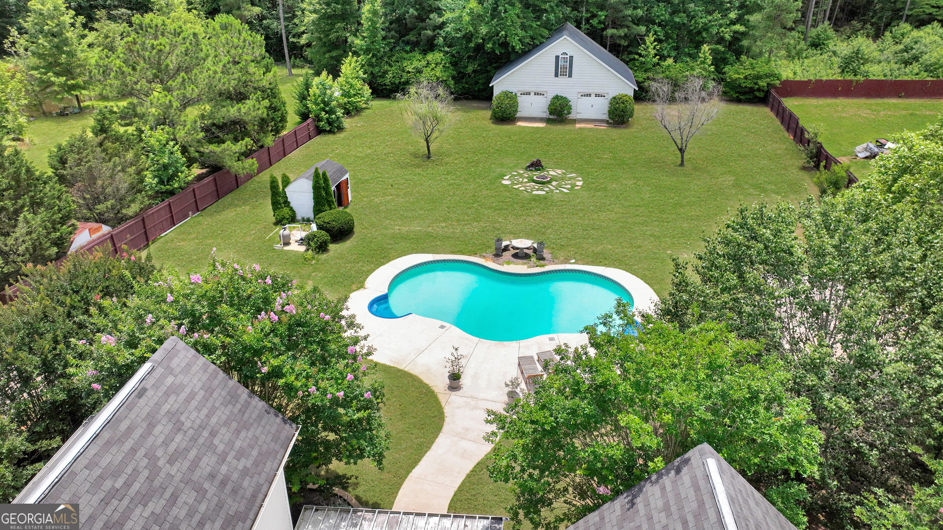 2022 Standing Rock Road Senoia, GA 30276 - Photo 5 of 36 an aerial view of a house with outdoor space and trees all around