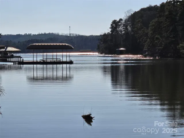 a view of pool with seating area