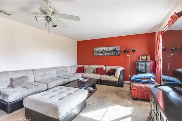 a living room with furniture and couch