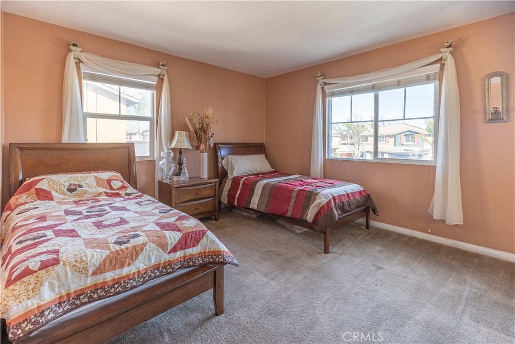 9131 Santa Barbara Drive Riverside, CA 92508 - Photo 10 of 29 a bedroom with two beds and a window