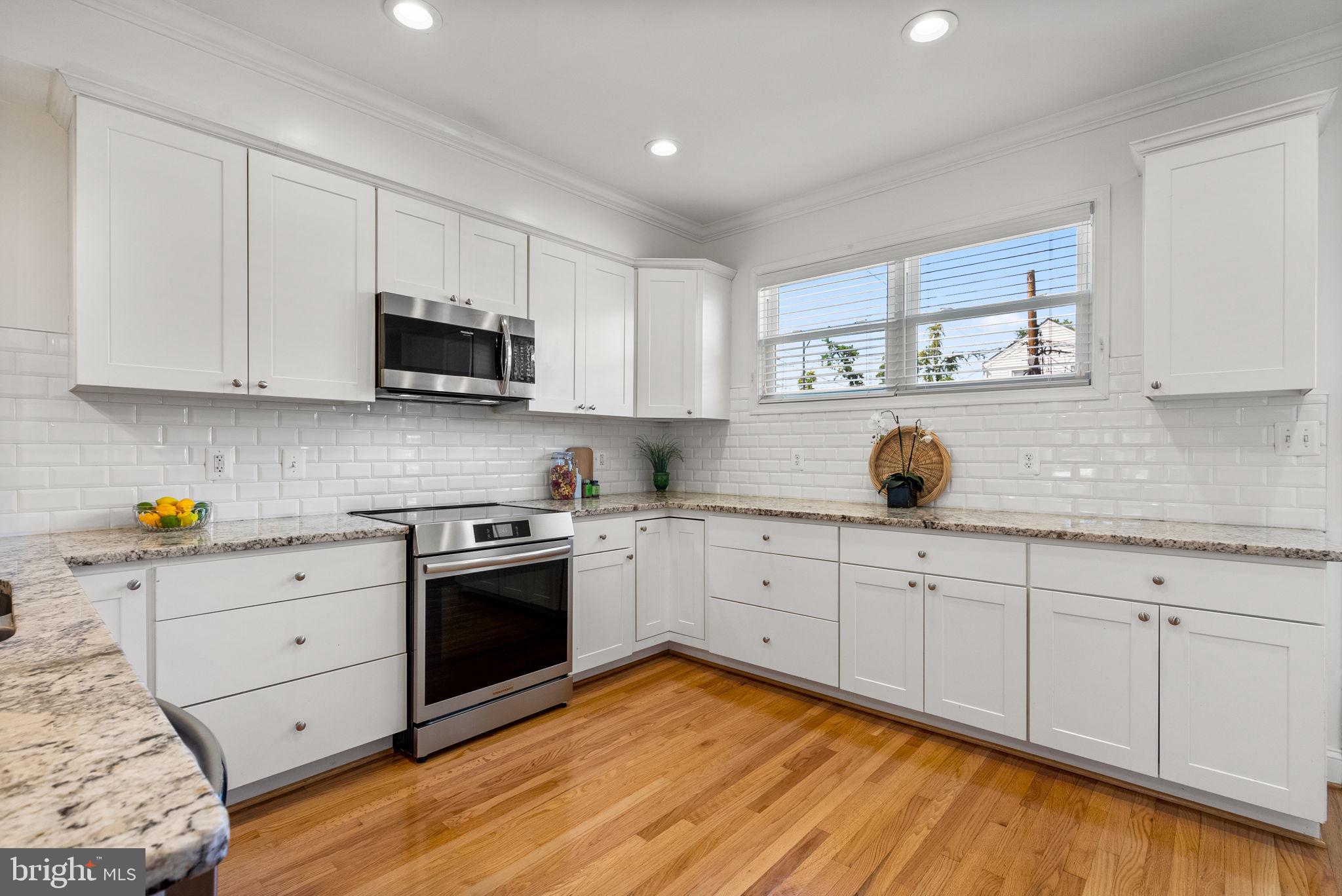 925 Decatur Street Northwest Washington, DC 20011 - Photo 12 of 41 Renovated kitchen with new induction stove