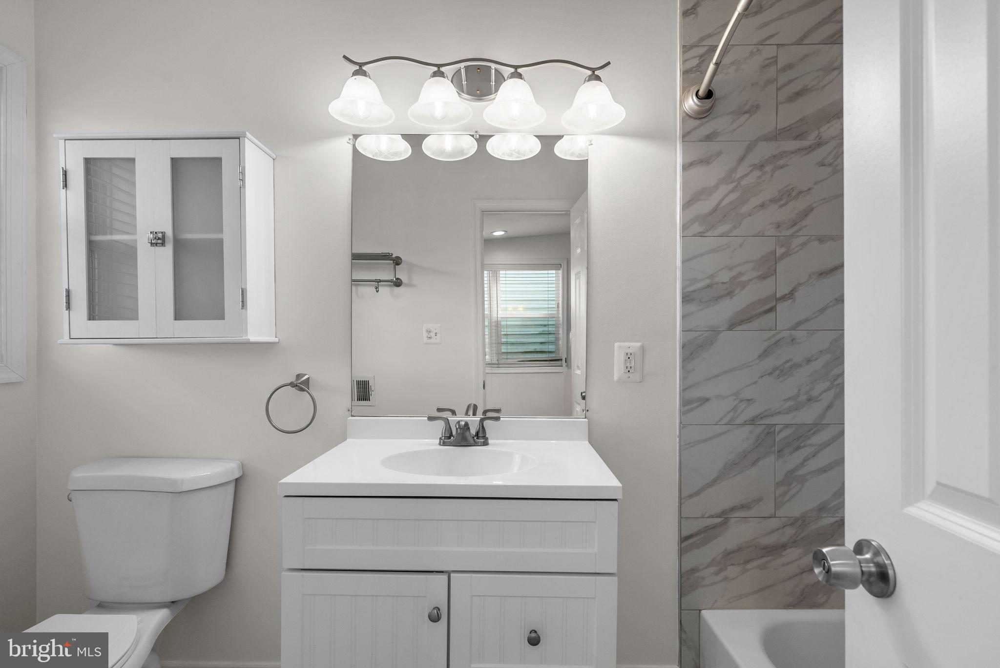 925 Decatur Street Northwest Washington, DC 20011 - Photo 19 of 41 Renovated primary bath