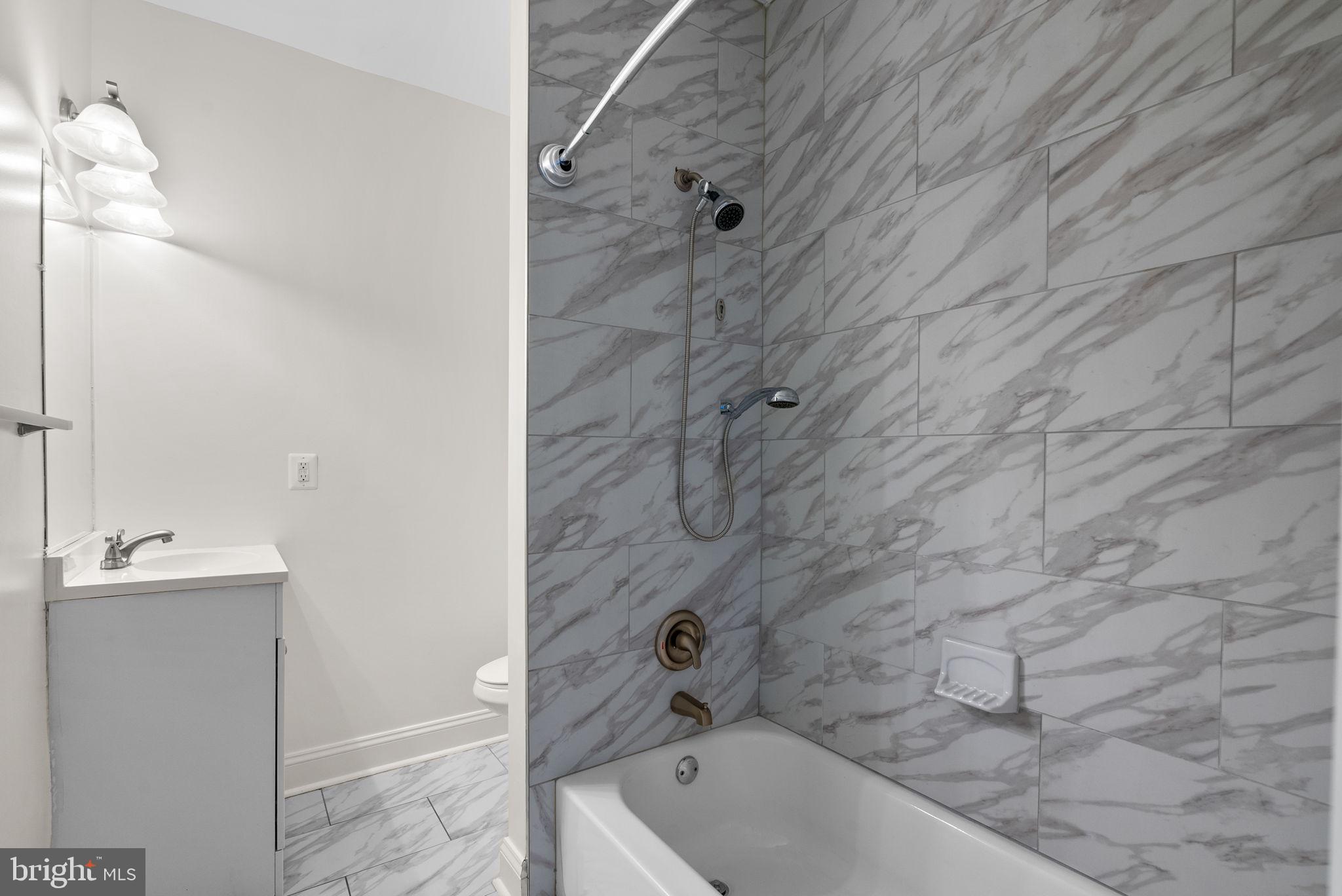 925 Decatur Street Northwest Washington, DC 20011 - Photo 26 of 41 Hall bath