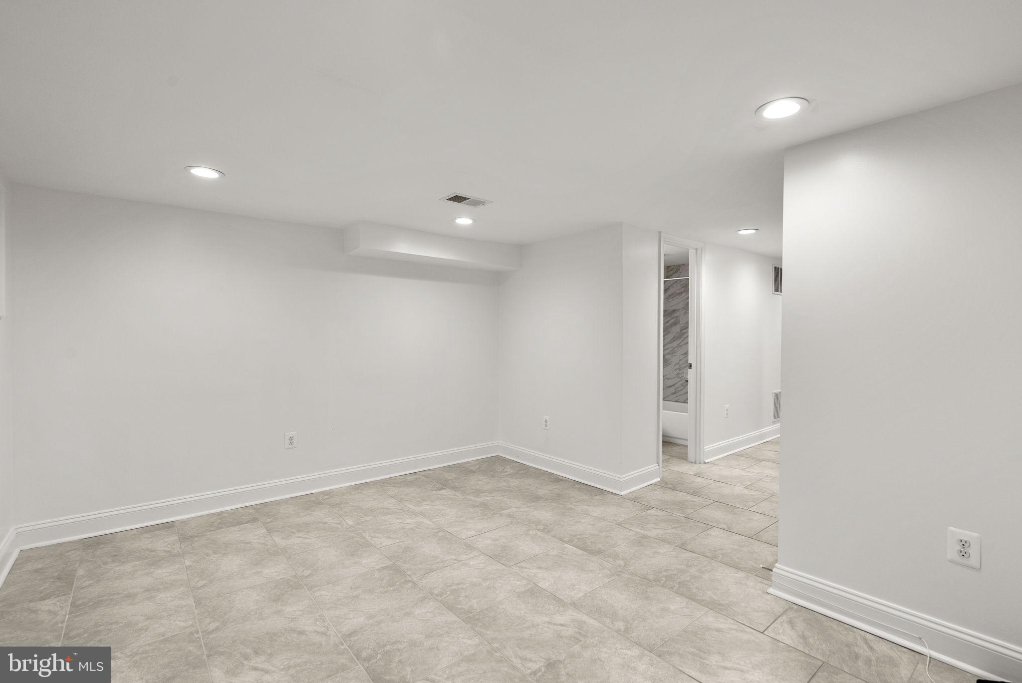 925 Decatur Street Northwest Washington, DC 20011 - Photo 28 of 41 Lower-level rec room