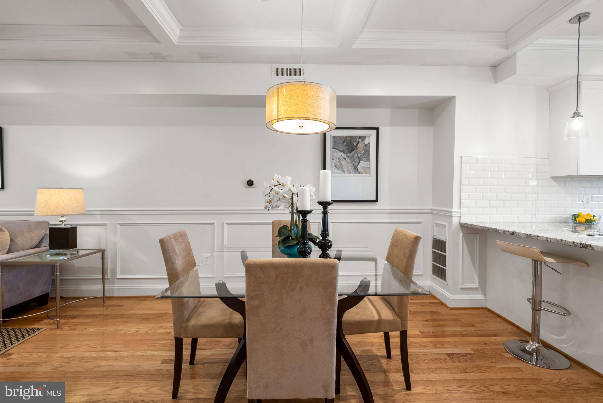 925 Decatur Street Northwest Washington, DC 20011 - Photo 9 of 41 Dining area with chair and picture moldings