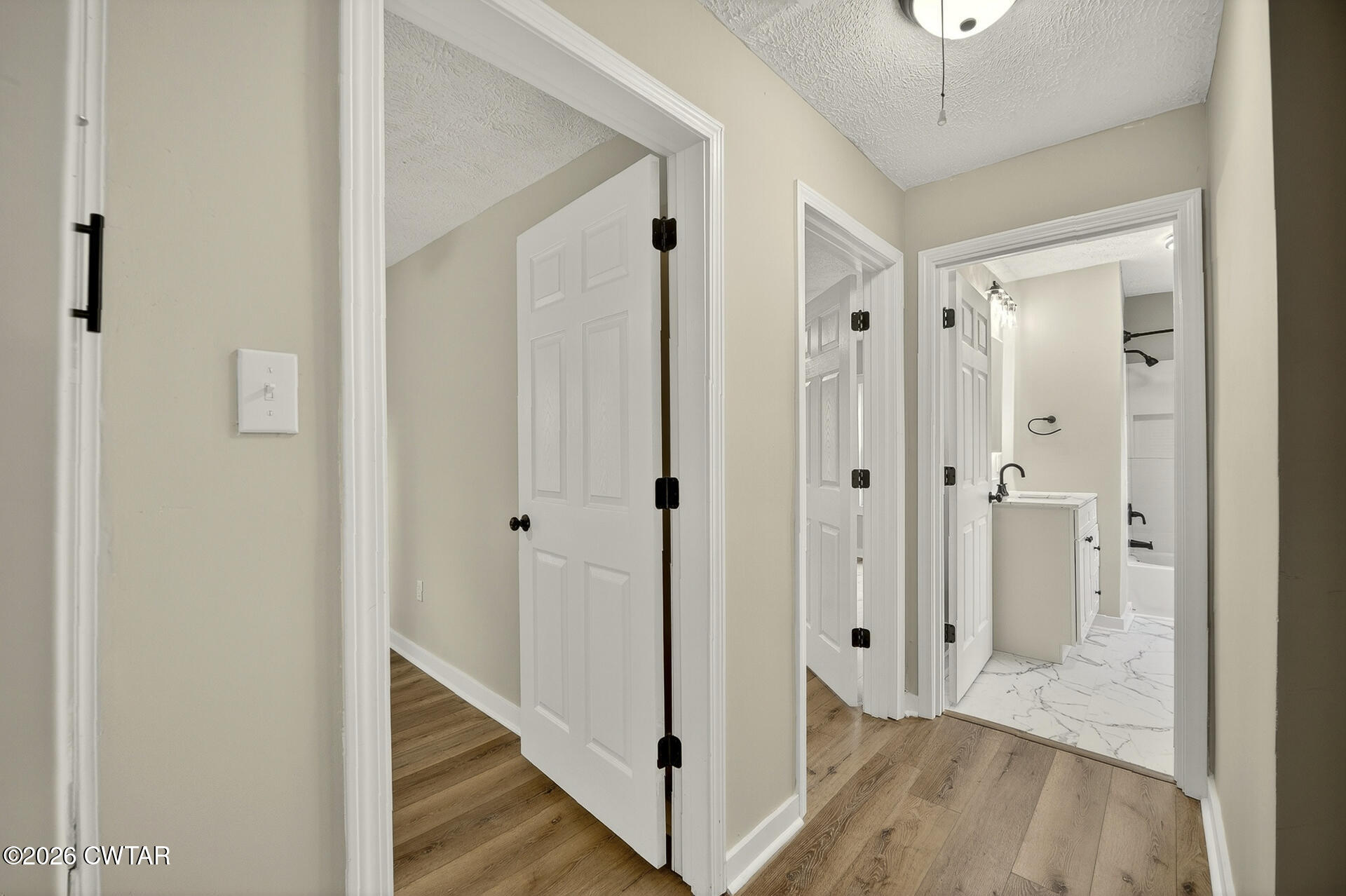 402 Harts Bridge Road Jackson, TN 38301 - Photo 11 of 38 a view of a hallway with wooden floor