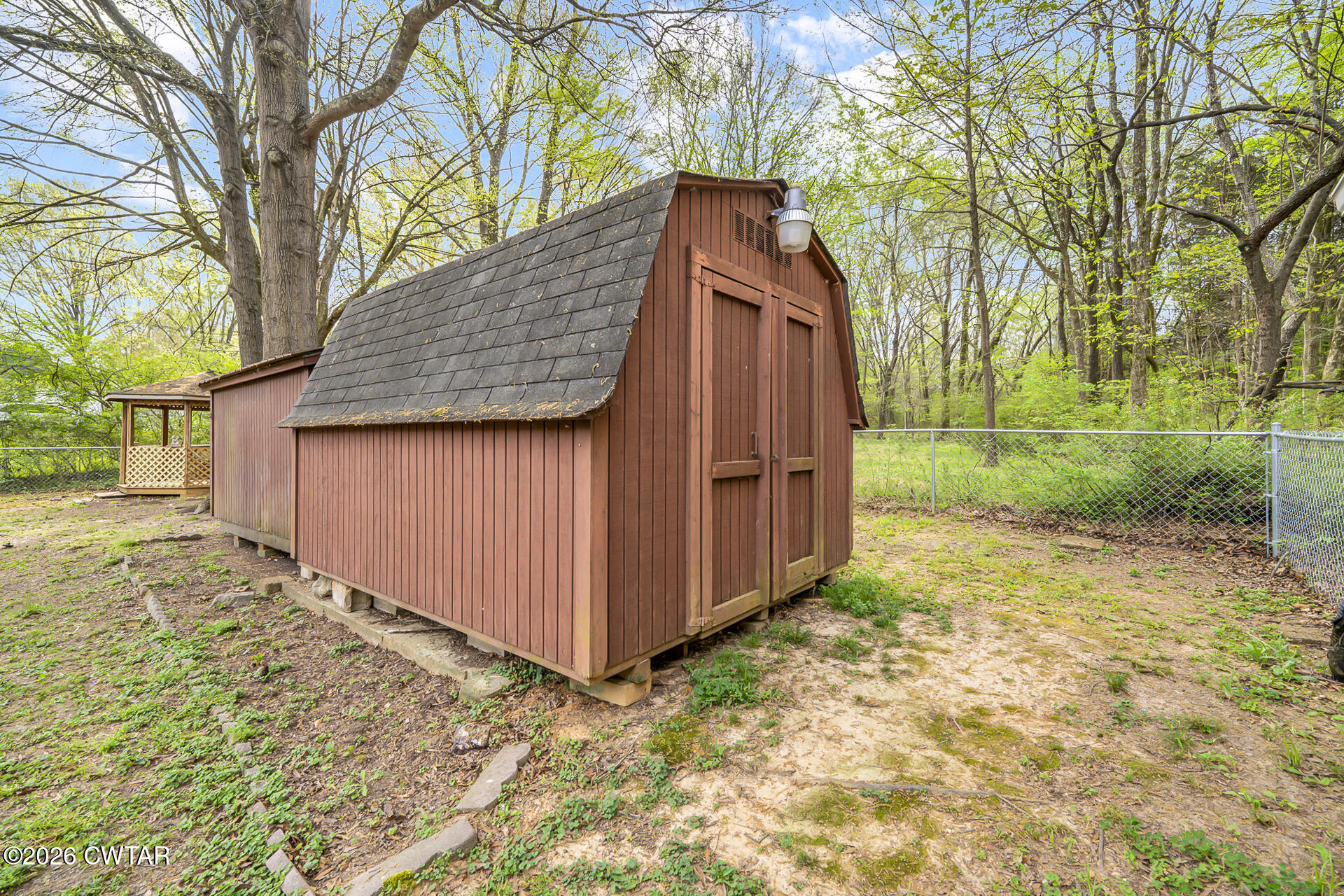 402 Harts Bridge Road Jackson, TN 38301 - Photo 27 of 38 a view of backyard of house and trees