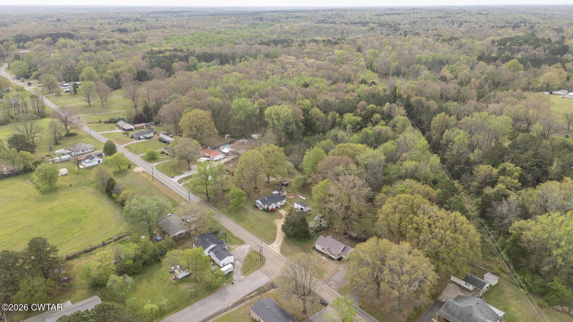 402 Harts Bridge Road Jackson, TN 38301 - Photo 36 of 38 an aerial view of a house with a yard