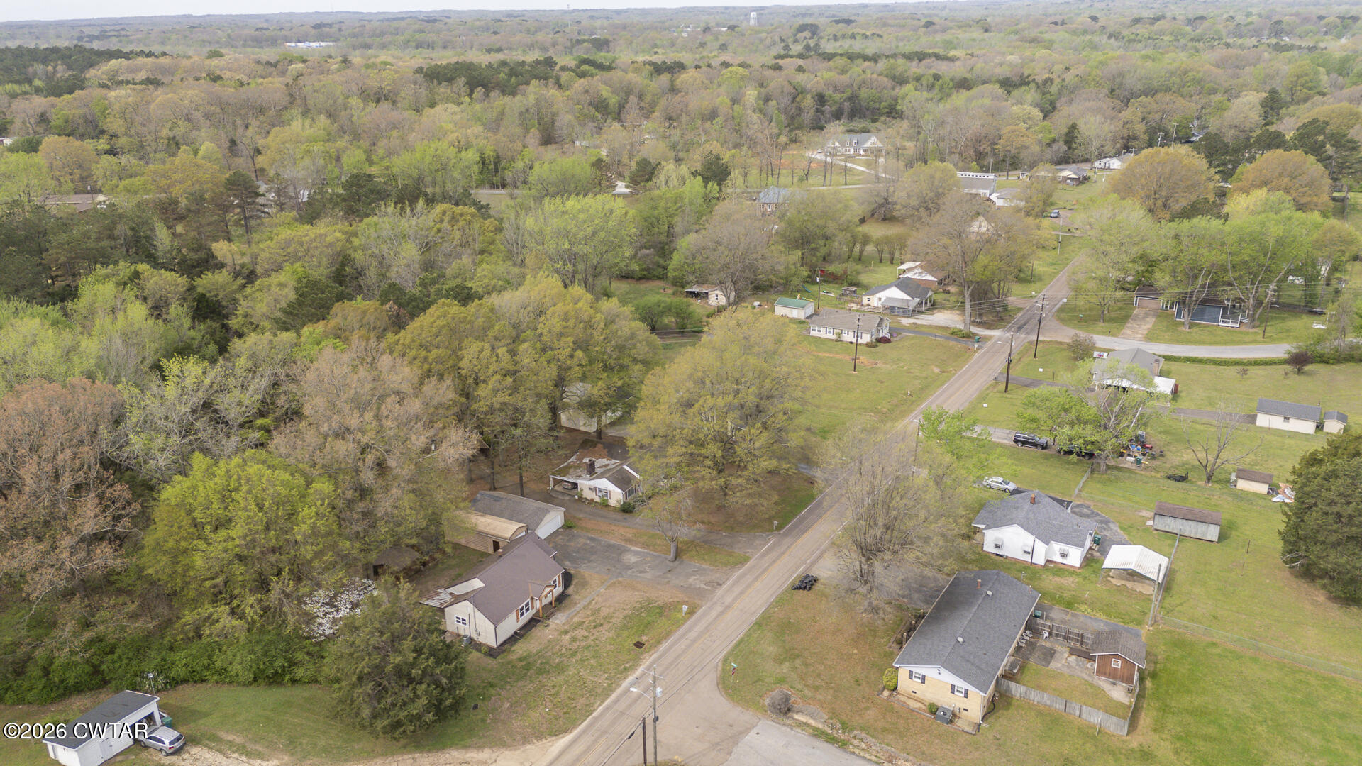 402 Harts Bridge Road Jackson, TN 38301 - Photo 37 of 38 an aerial view of a residential houses with outdoor space