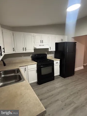 a utility room with washer and dryer