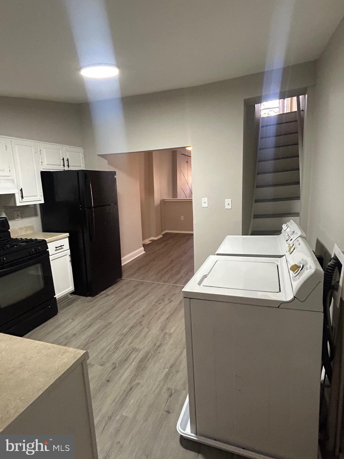 1807 Ramsay Street Baltimore, MD 21223 - Photo 6 of 13 a utility room with washer and dryer