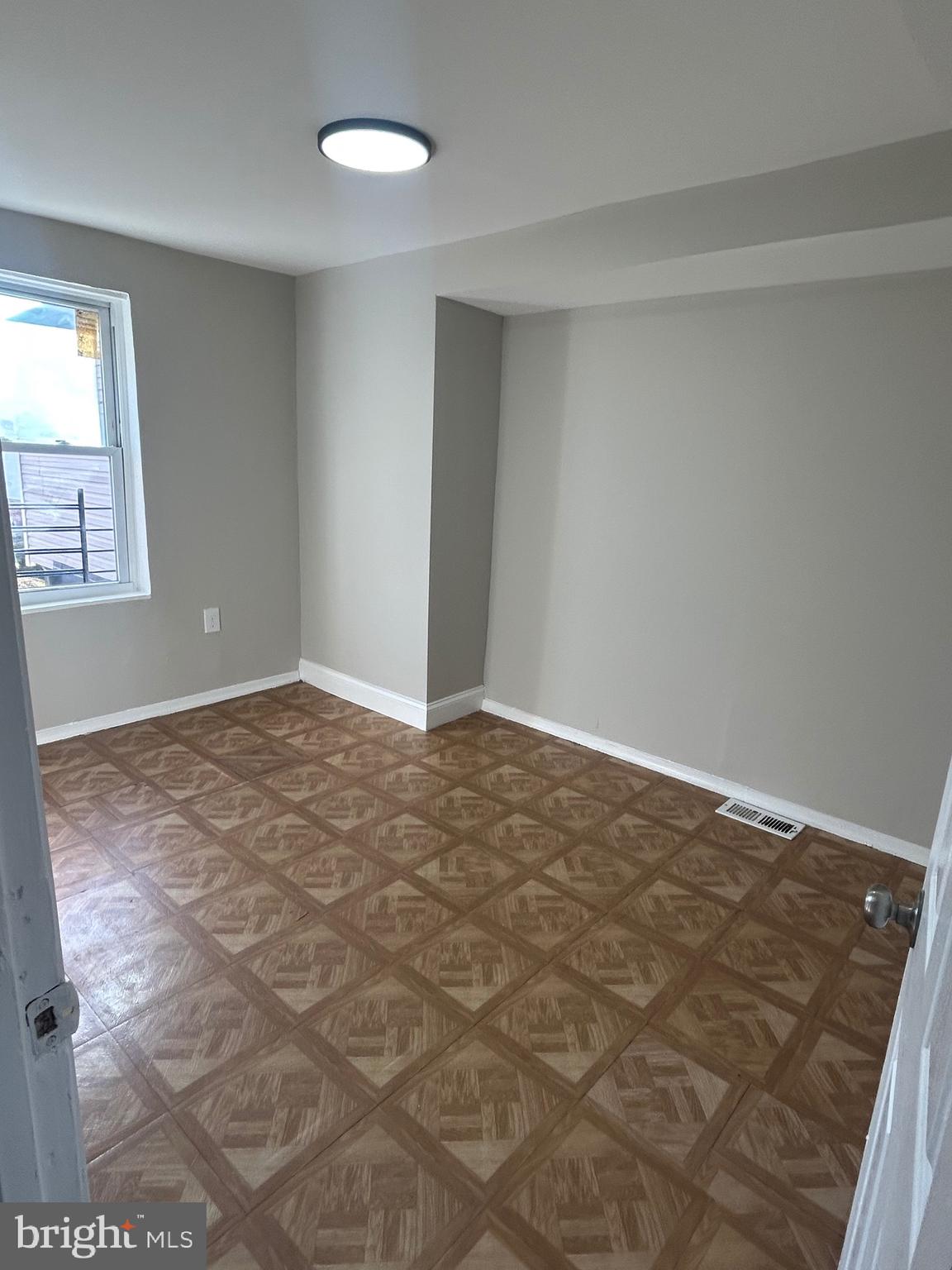 1807 Ramsay Street Baltimore, MD 21223 - Photo 9 of 13 a view of an empty room