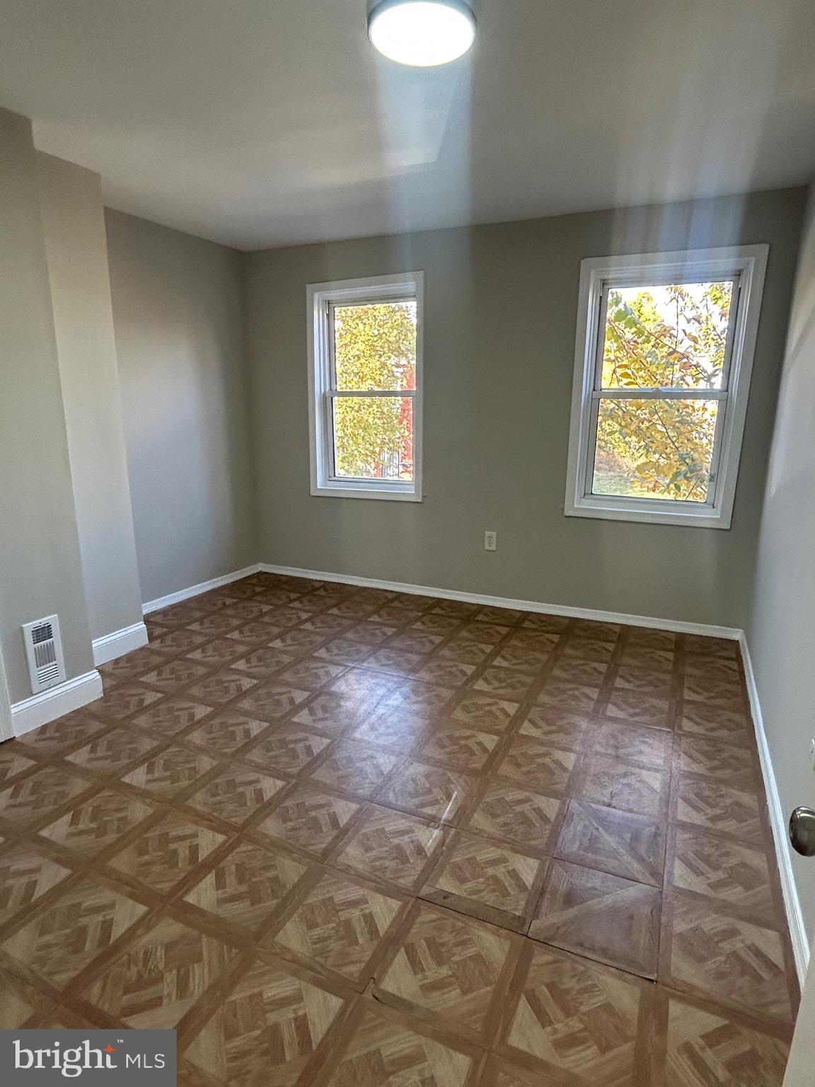 1807 Ramsay Street Baltimore, MD 21223 - Photo 10 of 13 a view of an empty room and window