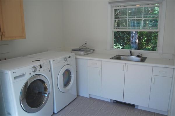32 Sherburne Road Lexington, MA 02421 - Photo 13 of 24 a utility room with dryer and washer