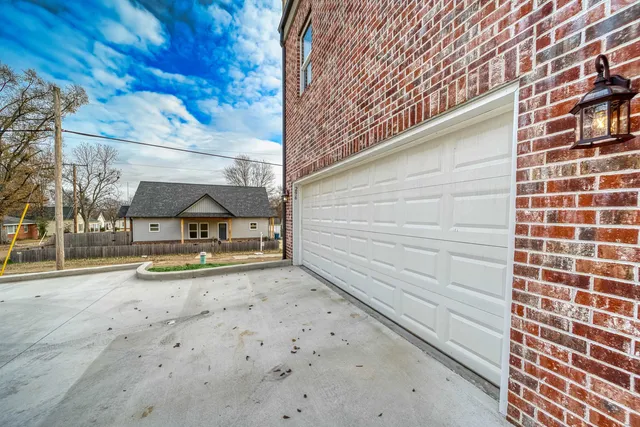 a view of a backyard with a patio
