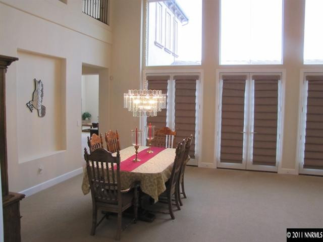 1995 Champion Reno, NV 89523 - Photo 3 of 13 a view of a dining room with furniture and window