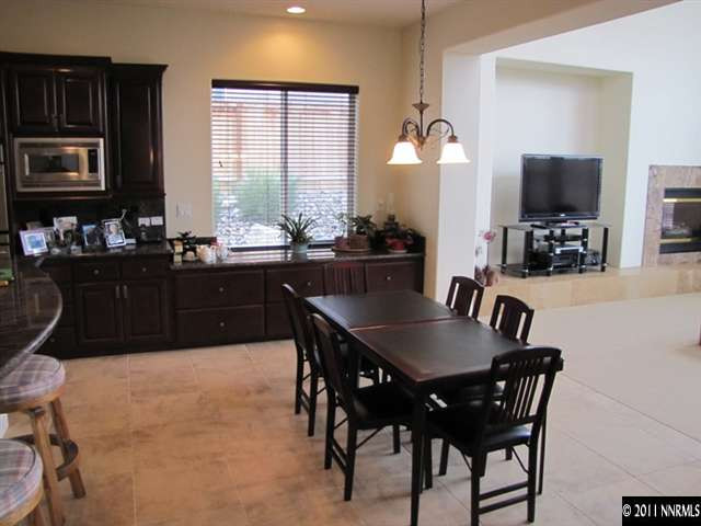 1995 Champion Reno, NV 89523 - Photo 6 of 13 a view of a dining room with furniture and chandelier