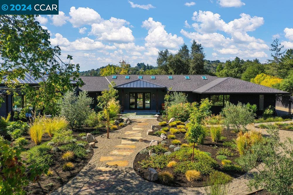 1154 Camino Vallecito Lafayette, CA 94549 - Photo 1 of 1 a view of a house with a yard and garden