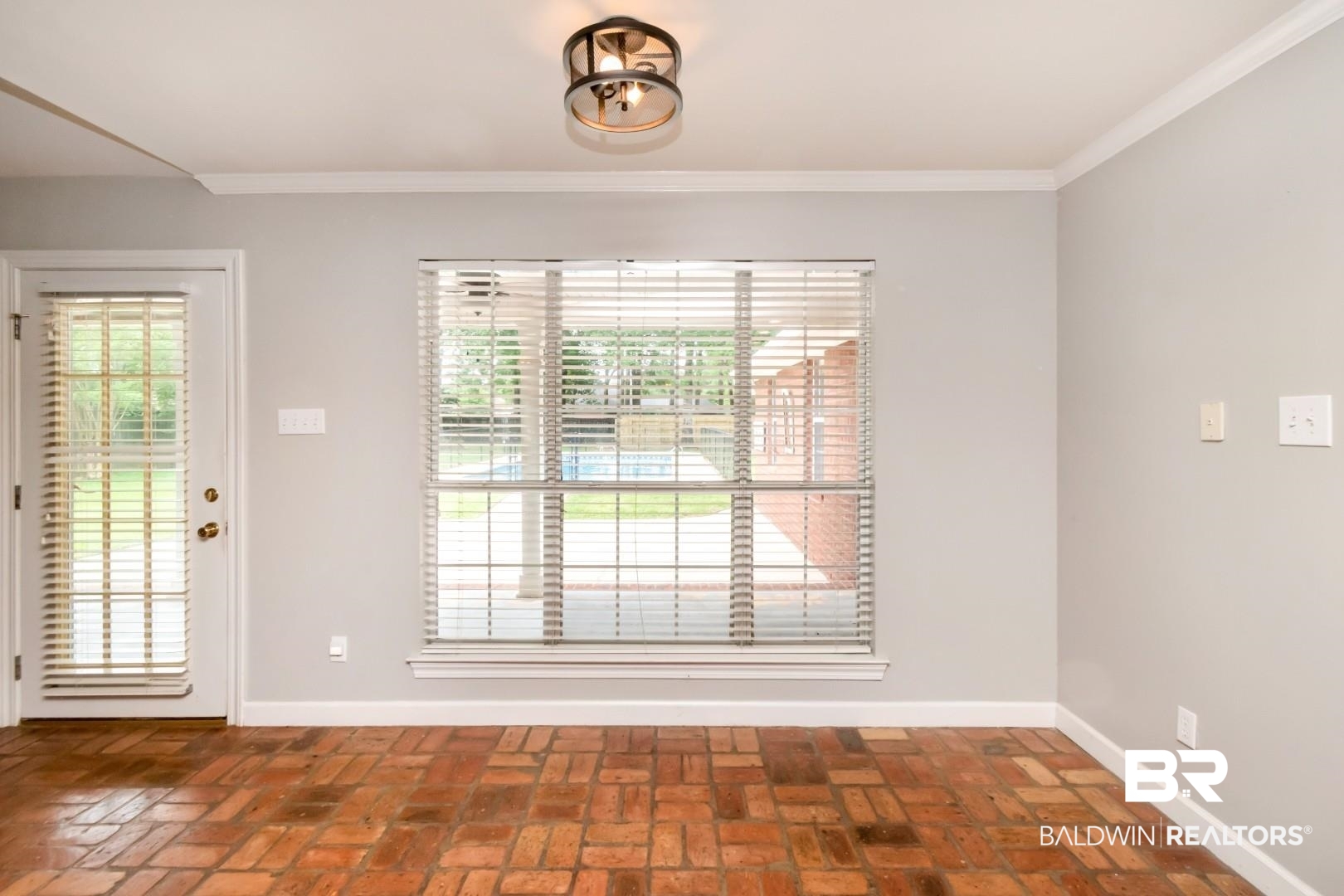 10691 Hunters Ridge Drive Mobile, AL 36695 - Photo 13 of 37 Brick-pattern flooring and white baseboards