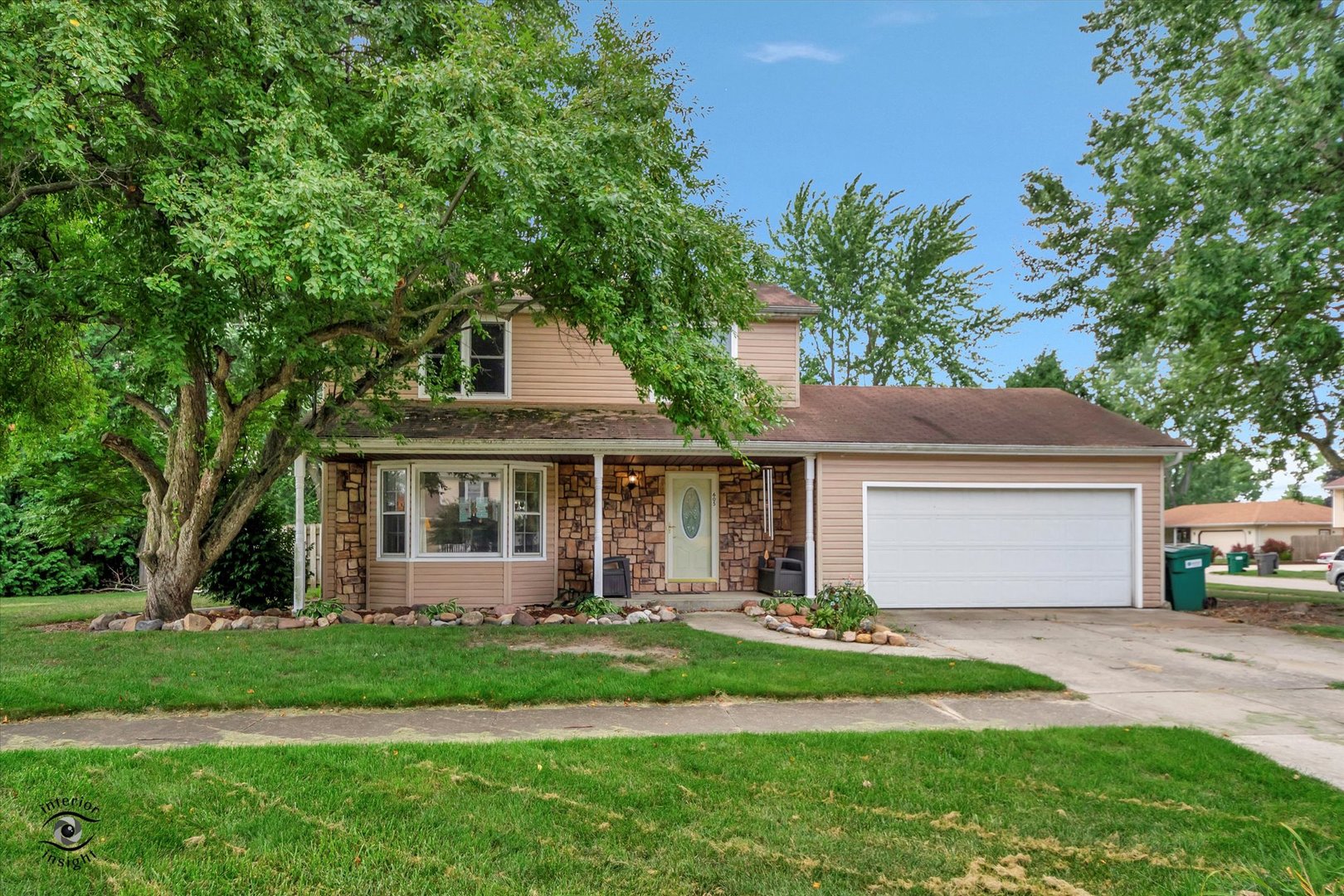 605 Ridge Street Wilmington, IL 60481 - Photo 1 of 26 front view of a house and a yard