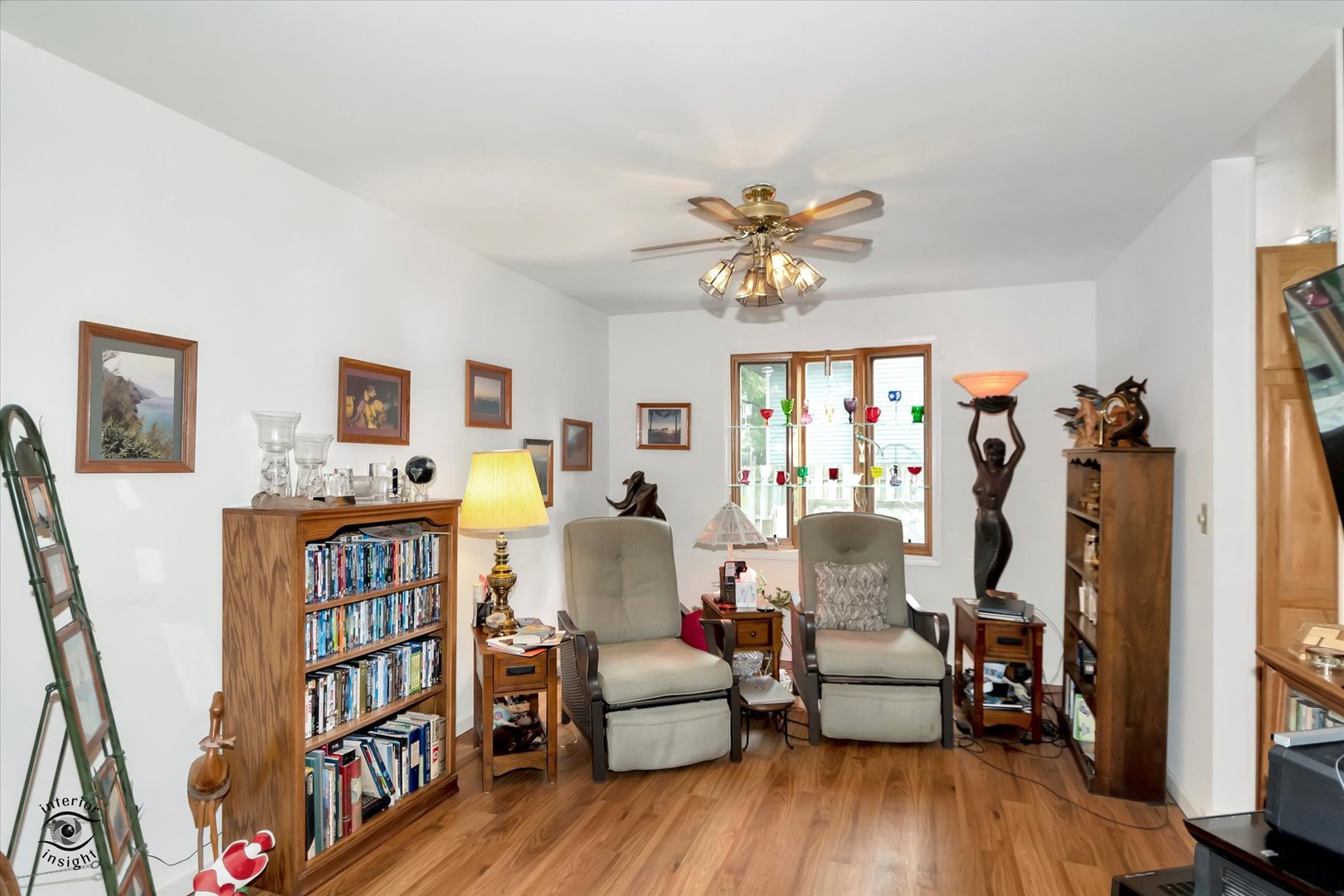 605 Ridge Street Wilmington, IL 60481 - Photo 11 of 26 a living room with furniture and a wooden floor