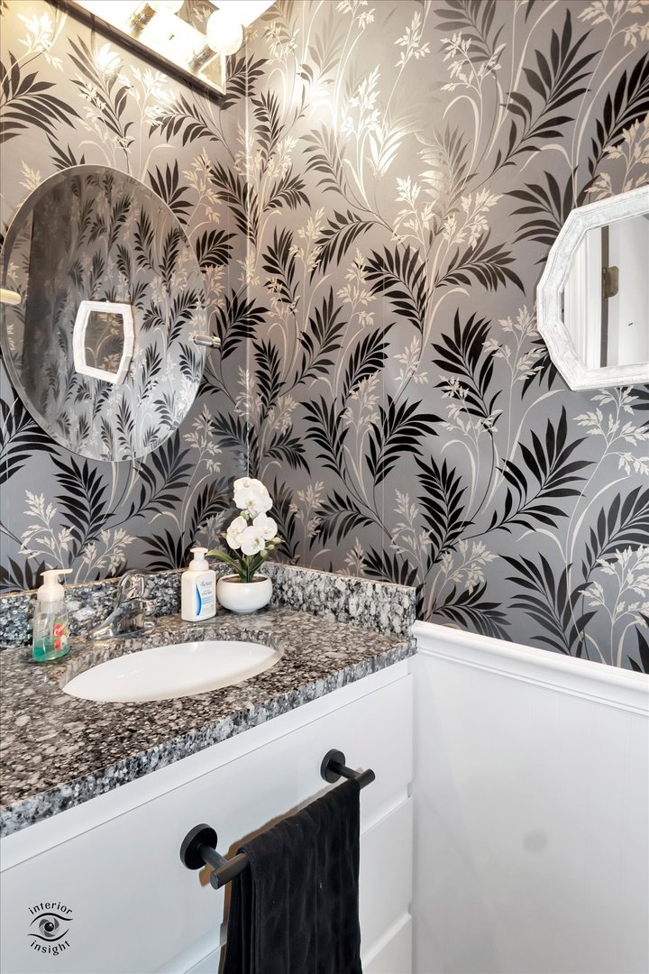 605 Ridge Street Wilmington, IL 60481 - Photo 18 of 26 a close view of sink and mirror