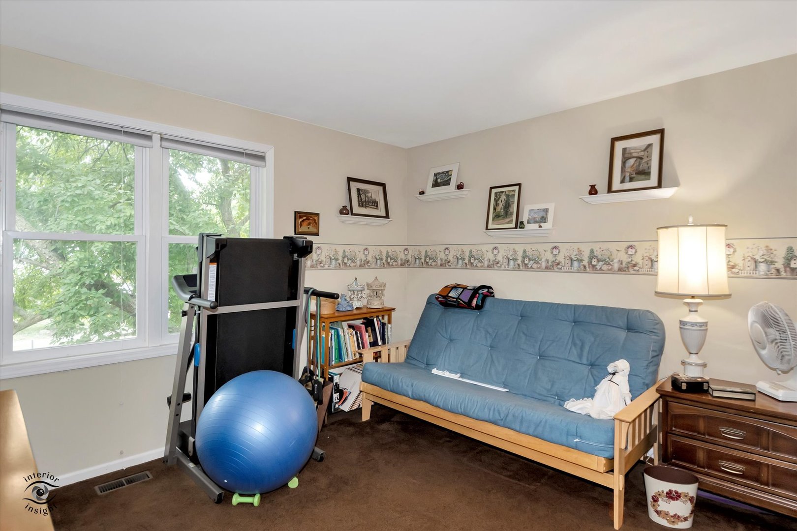 605 Ridge Street Wilmington, IL 60481 - Photo 26 of 26 a living room with a couch and a table